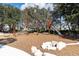 Community playground with climbing features, slide and wood chip ground cover at 4496 Tatum Loop, Odessa, FL 33556