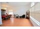 Spacious dining room with laminate flooring, bright lighting and ample space for entertaining at 4535 Gateway Blvd, Wesley Chapel, FL 33544