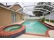 Enjoy this beautiful pool with a screened enclosure for outdoor fun and relaxation at 4535 Gateway Blvd, Wesley Chapel, FL 33544
