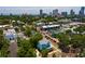 Aerial view of a home with gray metal roof, in a neighborhood with city views at 457 8Th N Ave, St Petersburg, FL 33701