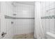 Clean and modern bathroom with white tiled shower, complemented by decorative accents for a spa-like experience at 457 8Th N Ave, St Petersburg, FL 33701