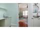 En-suite bathroom leading to bedroom with a charming wash basin at 457 8Th N Ave, St Petersburg, FL 33701