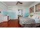 Spacious bedroom with hardwood floors, natural light, and an adjoining room, providing a comfortable retreat at 457 8Th N Ave, St Petersburg, FL 33701