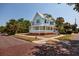 Inviting two-story home with a spacious wrap-around porch on a corner lot at 457 8Th N Ave, St Petersburg, FL 33701