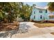 Exterior view of the house featuring the side yard and parking space at 457 8Th N Ave, St Petersburg, FL 33701
