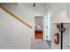 Hallway with staircase leading to the bedroom showcasing hardwood floors, creating a warm and inviting transition at 457 8Th N Ave, St Petersburg, FL 33701