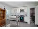 Bright kitchen features white cabinets, stainless steel appliances, and granite countertops at 457 8Th N Ave, St Petersburg, FL 33701