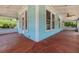 Exterior porch showcasing light blue paint and wooden floor at 457 8Th N Ave, St Petersburg, FL 33701