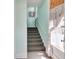 Stairway with neutral carpeting, leading to the upper level at 457 8Th N Ave, St Petersburg, FL 33701