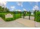 A well-maintained dog park with lush green grass, secure fencing, and shaded picnic areas offers a safe and enjoyable space at 4830 Grand Banks Dr, Wimauma, FL 33598