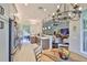 Bright kitchen featuring a breakfast bar, stainless steel appliances and easy access to the living area at 4830 Grand Banks Dr, Wimauma, FL 33598