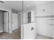 Modern bathroom featuring a glass-enclosed shower, neutral tile, and modern fixtures at 4852 Trinidad Dr, Land O Lakes, FL 34639