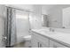 Bathroom with a shower and tub combo, vanity, commode, and a decorative shower curtain at 4852 Trinidad Dr, Land O Lakes, FL 34639