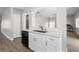 Kitchenette featuring pristine white countertops and sleek stainless steel appliances at 4852 Trinidad Dr, Land O Lakes, FL 34639