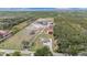 Expansive property featuring a house, pond, barns, and lots of land perfect for farming or recreational activities at 5012 Troydale Rd, Tampa, FL 33615