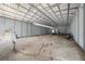 Vast metal barn interior with high ceilings and open space, ideal for various storage or workshop needs at 5012 Troydale Rd, Tampa, FL 33615