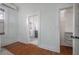 View from the bedroom showing a bathroom with patterned tile, and a walk-in closet at 5301 N Central Ave, Tampa, FL 33603