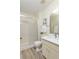 Modern bathroom features a glass-enclosed shower, new vanity, and neutral tones for a clean and updated look at 6334 Spring Flower Dr # 24, New Port Richey, FL 34653