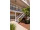 Exterior view of the condo building, featuring a staircase leading to the upper level units at 6334 Spring Flower Dr # 24, New Port Richey, FL 34653