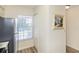 Bright kitchen featuring stainless steel appliances, closet, and exterior window at 6334 Spring Flower Dr # 24, New Port Richey, FL 34653