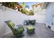 Backyard patio with stylish seating and string lights for a welcoming outdoor ambiance at 634 6Th N St, St Petersburg, FL 33701