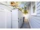 Enclosed backyard storage units with string lights enhancing the ambiance at 634 6Th N St, St Petersburg, FL 33701