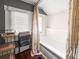 Bathroom displays a bathtub and a towel rack with a window to allow for ample light at 634 6Th N St, St Petersburg, FL 33701
