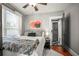 Stylish bedroom featuring a luxurious bed, elegant decor, and lots of light at 634 6Th N St, St Petersburg, FL 33701