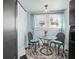 Charming dining area with glass table, seating for two, and natural light at 634 6Th N St, St Petersburg, FL 33701