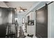 Modern kitchen with black appliances, white cabinets, and unique black and white checkered flooring at 634 6Th N St, St Petersburg, FL 33701