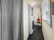 A cozy laundry room with a stacked washer and dryer for efficient space-saving at 634 6Th N St, St Petersburg, FL 33701