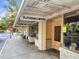 Charming storefront with a sidewalk cafe, featuring brick accents and a sign for Flatbread & Butter at 634 6Th N St, St Petersburg, FL 33701
