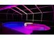 Inviting screened pool with spa, beautifully illuminated for nighttime enjoyment at 6724 Clair Shore Dr, Apollo Beach, FL 33572