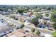 An aerial shot displays the house in relation to the surrounding neighborhood, enhancing its location at 7131 Vista Way, Port Richey, FL 34668