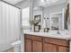 Bathroom with double vanity and neutral decor at 7238 Milestone Dr, Apollo Beach, FL 33572