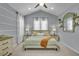 Inviting primary bedroom featuring neutral tones, vaulted ceilings, and bright natural light at 7238 Milestone Dr, Apollo Beach, FL 33572