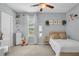Comfortable bedroom with neutral decor and a cozy atmosphere at 7238 Milestone Dr, Apollo Beach, FL 33572