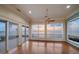 Bright living room with hardwood floors and large windows offering panoramic ocean views at 812 Point Seaside Dr, Crystal Beach, FL 34681