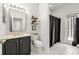 Bathroom features a single vanity and a shower with a privacy curtain at 9223 Brindlewood Dr, Odessa, FL 33556