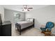 Cozy bedroom featuring soft natural light and comfortable furnishings at 9223 Brindlewood Dr, Odessa, FL 33556