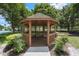 A community gazebo in a green space provides a shaded outdoor gathering area at 9223 Brindlewood Dr, Odessa, FL 33556