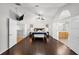 Expansive main bedroom with elegant decor, wood floors, and ensuite bath access at 9223 Brindlewood Dr, Odessa, FL 33556