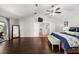 Spacious main bedroom featuring wood floors, ensuite access, and natural light at 9223 Brindlewood Dr, Odessa, FL 33556