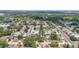 Aerial view of a neighborhood with mature trees, and convenient access to nearby amenities at 9810 N 53Rd St, Temple Terrace, FL 33617