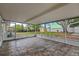 Spacious screened patio overlooking backyard, perfect for outdoor living at 9810 N 53Rd St, Temple Terrace, FL 33617