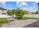 Backyard featuring a brick-paved patio and an inground planted area at 10808 Whitecap Dr, Riverview, FL 33579