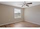 Bedroom with wood-look floors and a window with natural light at 10808 Whitecap Dr, Riverview, FL 33579
