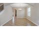 Open concept dining area features decorative tile flooring, neutral paint and chandelier lighting at 10808 Whitecap Dr, Riverview, FL 33579