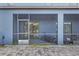 View of the screened-in lanai that features a paved patio at 10808 Whitecap Dr, Riverview, FL 33579