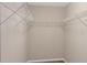 Walk-in closet featuring wire shelving and wood look floors at 10808 Whitecap Dr, Riverview, FL 33579